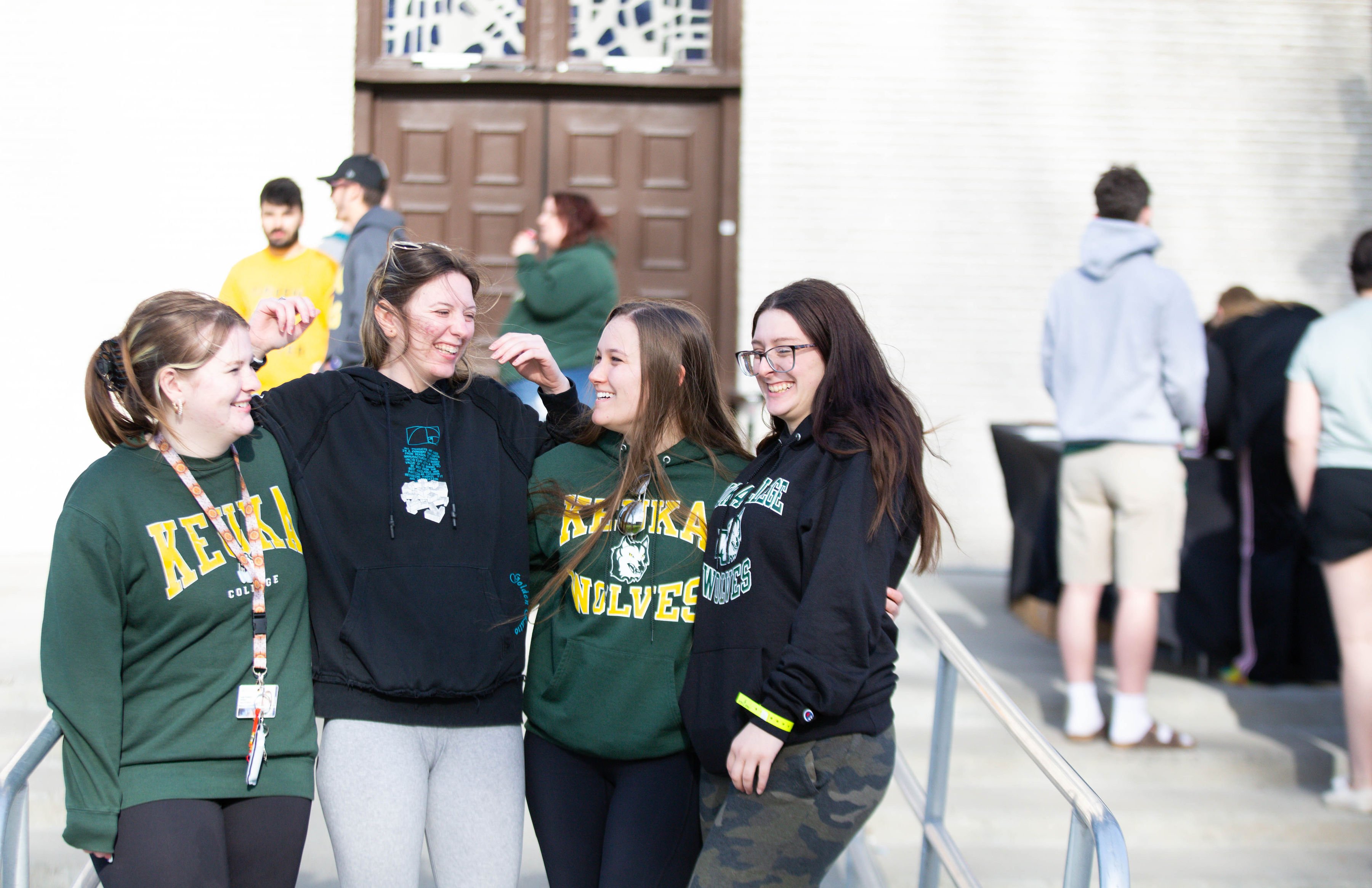 Students Smiling Outside Norton Chapel 