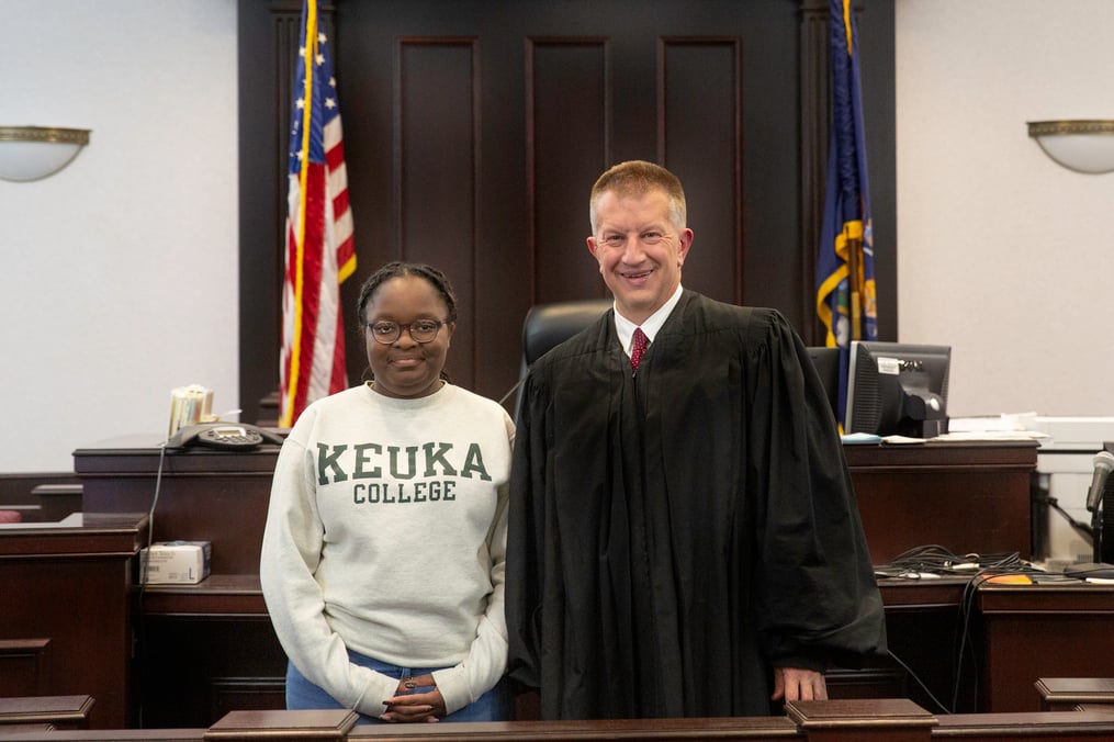 Kameisha Reid and Supreme Court Justice Jason Cook in the Yates County Courthouse