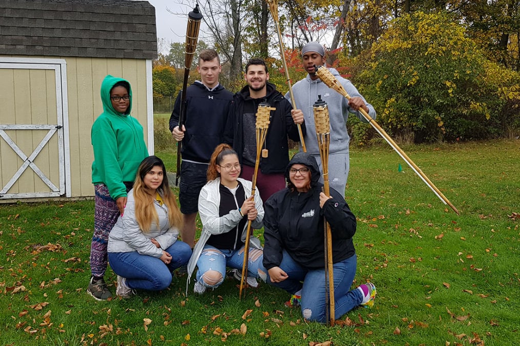 These Keuka College students, helping out at Camp Cory, were among the 44 members of the College community participating in Make a Difference Day. 