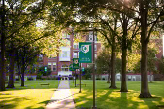 Photo of Ball Hall and Campus signage on Keuka College campus
